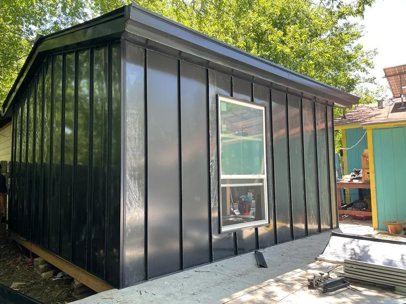 Black standing seam metal wall panels for Metal Roof Installation in Moore